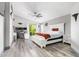 Bright main bedroom features vaulted ceilings, sliding doors, and a built-in office space at 1575 S Pennington Dr, Chandler, AZ 85286