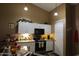 Well-equipped kitchen with white cabinets, a pantry, and modern appliances at 16011 N 35Th Dr, Phoenix, AZ 85053