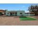 Quaint home featuring desert landscaping and a cozy bench at 1613 W Flower N Cir, Phoenix, AZ 85015
