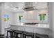 Stylish kitchen featuring a kitchen island with bar seating, and bright accents at 1613 W Flower N Cir, Phoenix, AZ 85015