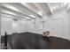Expansive living room featuring dark floors and bright, natural light at 1613 W Flower N Cir, Phoenix, AZ 85015