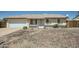 Charming single-story home with desert landscaping and two car garage at 17232 N 29Th Ave, Phoenix, AZ 85053