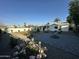 Beautiful backyard with gravel, stone pavers, landscaping, and mature trees at 1930 W Missouri Ave, Phoenix, AZ 85015