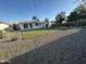 Charming home featuring well-maintained yard with stone landscaping at 1930 W Missouri Ave, Phoenix, AZ 85015