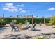 Cozy backyard fire pit with comfortable seating, ideal for relaxing evenings under the stars at 1930 W Missouri Ave, Phoenix, AZ 85015