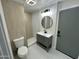 Contemporary bathroom with tiled walls, modern vanity, and walk-in shower at 1930 W Missouri Ave, Phoenix, AZ 85015