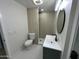Well-lit bathroom with updated fixtures, featuring a modern shower and vanity at 1930 W Missouri Ave, Phoenix, AZ 85015