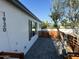 This home features a private outdoor space with a paver patio and modern wood accents at 1930 W Missouri Ave, Phoenix, AZ 85015
