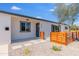 Inviting home exterior showcasing a modern entrance and xeriscaped front yard for low maintenance at 1930 W Missouri Ave, Phoenix, AZ 85015