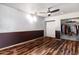 Spacious bedroom featuring laminate wood flooring and a walk-in closet with ample storage space at 19648 N 8Th Pl, Phoenix, AZ 85024
