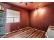 Bedroom with wood floors, bright window, and modern recessed lighting at 19648 N 8Th Pl, Phoenix, AZ 85024