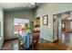 Bright dining area with tile floors and views to the kitchen and backyard at 19648 N 8Th Pl, Phoenix, AZ 85024