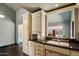 Kitchen with granite countertops and stylish cabinetry, offering a view to the Gathering room at 19648 N 8Th Pl, Phoenix, AZ 85024