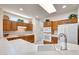 Bright kitchen with counter seating and neutral colors at 19662 N Overton Ct, Surprise, AZ 85374