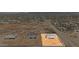 Aerial view of a home site in a new development showing the home's location on the lot at 1969 E Long Rifle Rd, Phoenix, AZ 85086