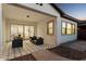 Covered patio showcasing stylish furniture and decorative tile flooring for outdoor relaxation at 21120 E Superstition Dr, Queen Creek, AZ 85142