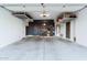 An open two-car garage featuring lots of built in shelving for maximum storage at 21120 E Superstition Dr, Queen Creek, AZ 85142