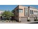 Modern townhome with a private garage and well-maintained desert landscaping enhancing the curb appeal at 23083 N 74Th Pl, Scottsdale, AZ 85255