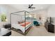 Airy primary bedroom with a four-poster bed, modern furnishings, and a calming color palette at 23083 N 74Th Pl, Scottsdale, AZ 85255