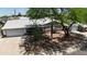 Aerial view of a charming single-story home showcasing its landscaped front yard and two-car garage at 2432 W Echo Ln, Phoenix, AZ 85021