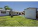 Large backyard featuring a refreshing pool, utility shed, and fire pit, great for outdoor living at 2432 W Echo Ln, Phoenix, AZ 85021