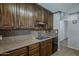 Well-maintained kitchen features ample storage, classic countertops, and modern appliances at 2432 W Echo Ln, Phoenix, AZ 85021