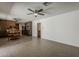 Bright, open living area with a dining area and a hallway leading to additional rooms at 2432 W Echo Ln, Phoenix, AZ 85021