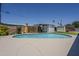 Backyard pool with a diving board, a grass and landscaped area with privacy walls at 2432 W Echo Ln, Phoenix, AZ 85021
