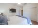 Bright bedroom offering a ceiling fan, closet, and neutral paint at 2514 E Grand Canyon Dr, Chandler, AZ 85249