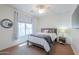 Cozy bedroom with carpet, bright natural light, and ceiling fan at 2514 E Grand Canyon Dr, Chandler, AZ 85249