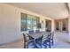 Comfortable covered patio with outdoor dining table, great for entertaining or relaxing outdoors at 2514 E Grand Canyon Dr, Chandler, AZ 85249