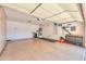 An empty garage with epoxy flooring, storage cabinets, and organizational tools for ultimate convenience at 2514 E Grand Canyon Dr, Chandler, AZ 85249