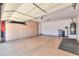 A spacious garage with epoxy flooring and lots of storage cabinets for tools and household items at 2514 E Grand Canyon Dr, Chandler, AZ 85249