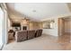 Open living room with a cozy fireplace and comfortable seating arrangement at 2514 E Grand Canyon Dr, Chandler, AZ 85249