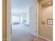 View of the main bedroom, showcasing the entryway with carpet floors and natural light throughout at 2514 E Grand Canyon Dr, Chandler, AZ 85249