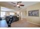 Comfortable office space with neutral carpet and walls, open to other rooms via archways at 2514 E Grand Canyon Dr, Chandler, AZ 85249
