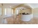 Open-concept office space featuring neutral walls and archway to a reception area at 2514 E Grand Canyon Dr, Chandler, AZ 85249