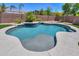 Inviting backyard pool and patio area for relaxing and enjoying the outdoors at 2514 E Grand Canyon Dr, Chandler, AZ 85249