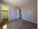 Spacious bedroom with neutral walls, carpet, and natural light, offering comfort and style at 25748 W Siesta Way, Buckeye, AZ 85326