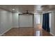 A generous living room with recessed lighting and tile floors at 25748 W Siesta Way, Buckeye, AZ 85326