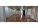 A generous living room with recessed lighting and tile floors at 25748 W Siesta Way, Buckeye, AZ 85326