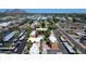 Wide aerial shot of the neighborhood showcasing the well-maintained complex with community pool and covered parking at 2625 E Indian School Rd # 206, Phoenix, AZ 85016