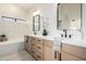 Bright bathroom features double sinks, modern fixtures, and stylish tile floors at 2716 N Kristen --, Mesa, AZ 85213