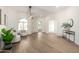 Bright entryway featuring hardwood floors, natural light, and modern decor at 2716 N Kristen --, Mesa, AZ 85213