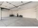 Spacious two car garage features ample storage and an attached door at 2716 N Kristen --, Mesa, AZ 85213