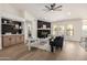 Open living area features a decorative fireplace wall and stylish furnishings at 2716 N Kristen --, Mesa, AZ 85213