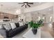 Bright living room featuring an open floor plan with wood floors and neutral decor at 2716 N Kristen --, Mesa, AZ 85213