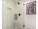 Modern shower features white subway tile, glass doors, and dark hardware at 2716 N Kristen --, Mesa, AZ 85213