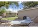 Serene backyard oasis featuring a hammock between two buildings, and palm trees at 3018 E Mulberry Dr, Phoenix, AZ 85016