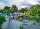 Charming home with solar panels, manicured landscaping, and inviting curb appeal at 3018 E Mulberry Dr, Phoenix, AZ 85016